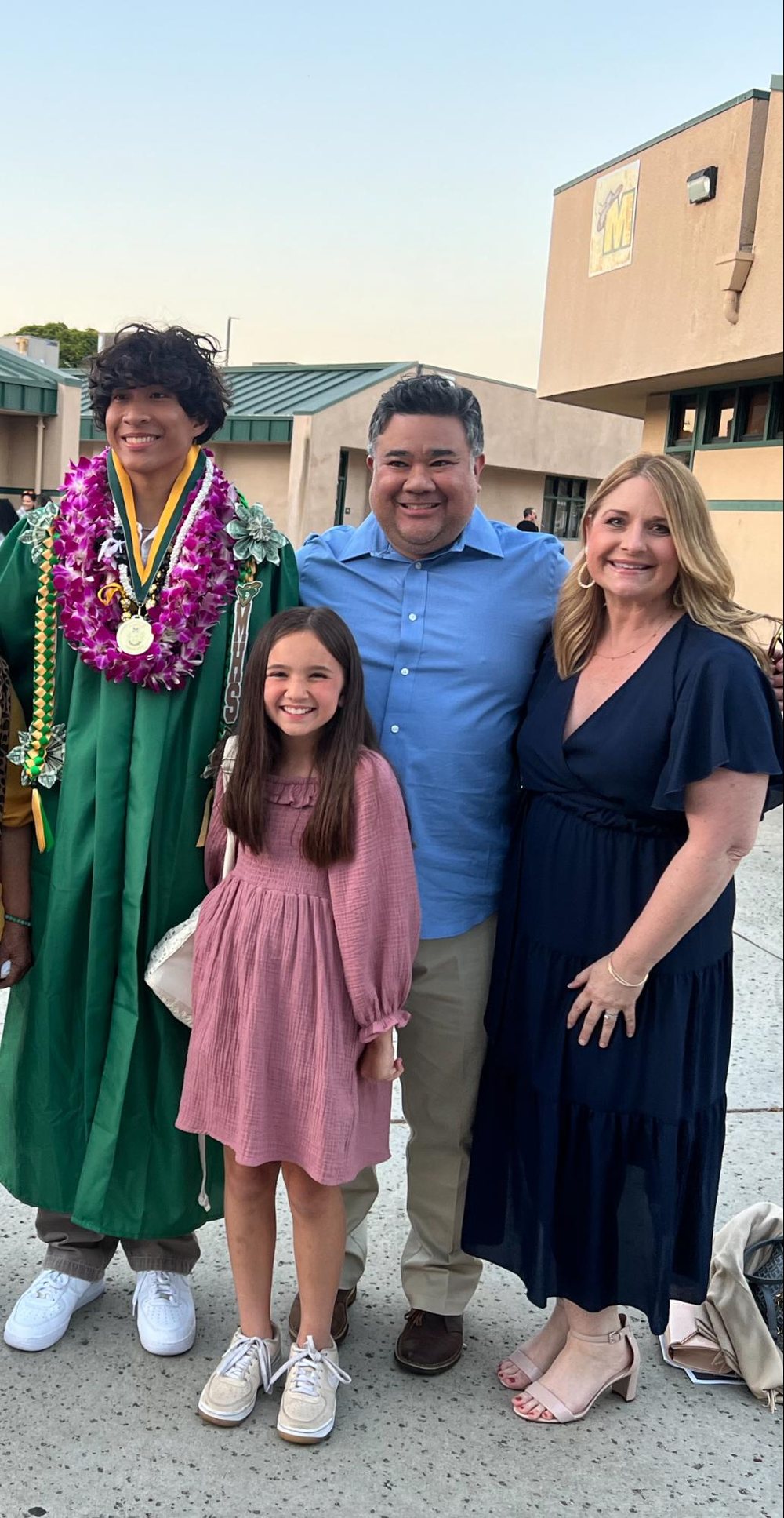 James, Jennifer, Julianna, and Ryan Guintu together at Ryan's graduation